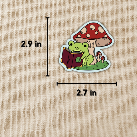 Kingdom of Threads Sticker Frog Reading Under Toadstool