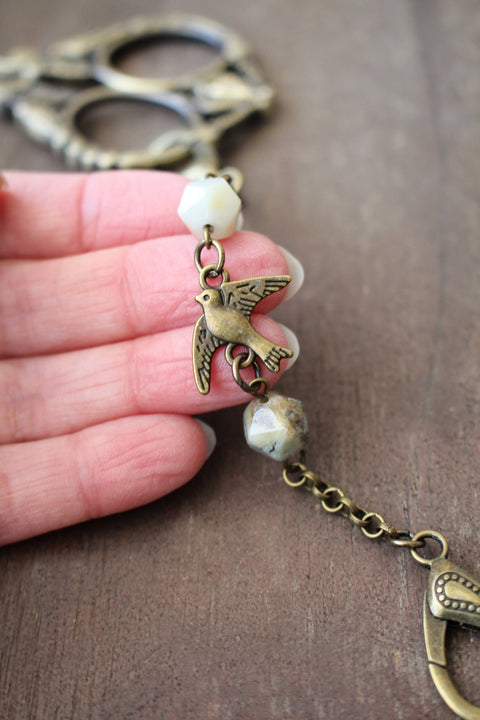 NNK Press Scissor Chain Swallow In Flight
