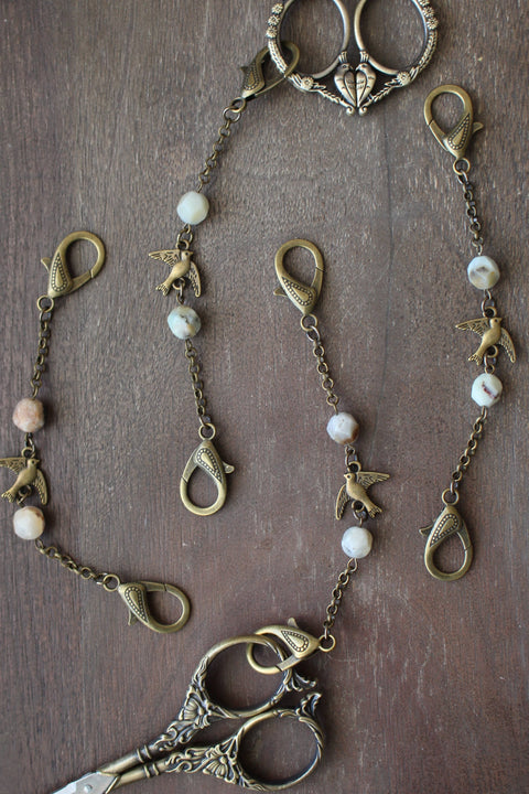 NNK Press Scissor Chain Swallow In Flight